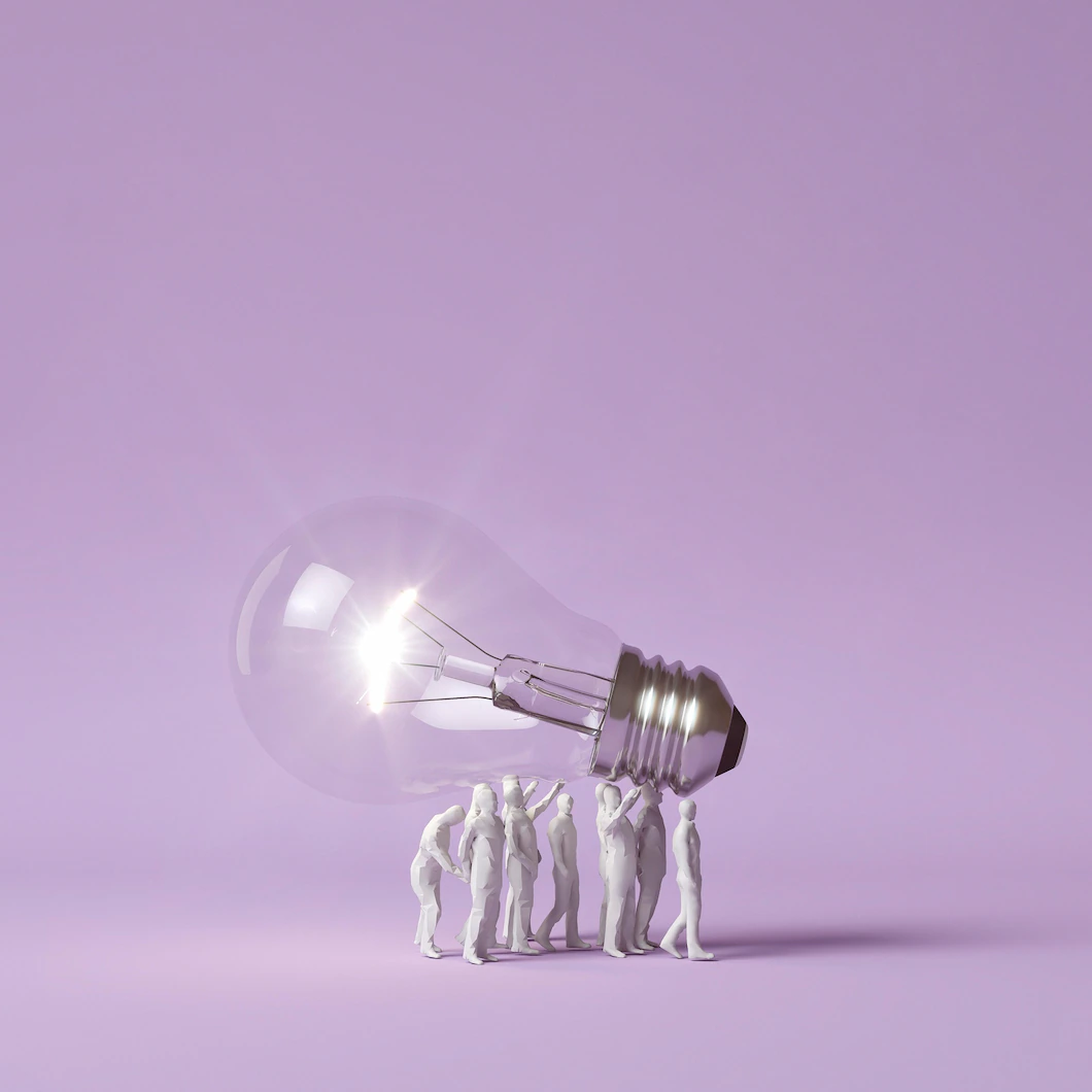 Illustration Human figurines carrying lit lightbulb as an idea concept